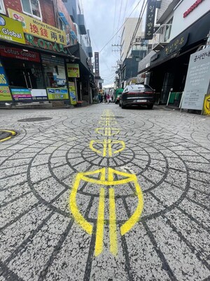 The vibrant neighbourhoods of Hongdae and Itaewon featured impressive graffiti Shield stencilled across the sidewalks of Seoul