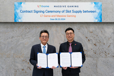Signing ceremony of MVG and LT Game - (From left) George Cho, Director of Massive Gaming Pty. Ltd; Eddie Au, Chief Operating Officer of LT Game Limited (PRNewsfoto/Massive Gaming Pty. Ltd.)