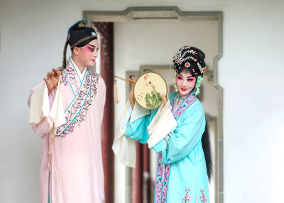 Two opera artists perform in the Beijing Garden Expo Park.