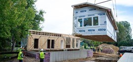 Professional basketball player turned housing developer, Gorgui Dieng, is watching the clock and likes what he sees