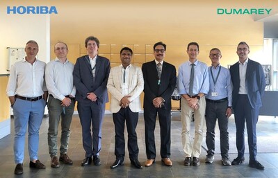 A group photograph of officials from HORIBA India and Dumarey Group (L-R: Riccardo Caramassi (New Business Development Director), Mirco De Marco (Senior Product Owner), Emanuele Patti (Sales and Marketing Director) from the Dumarey Group, Abhishek Agarwal (Business Head – Mobility and Energy), Dr. Rajeev Gautam (President) from HORIBA India, Gianmarco Boretto (Hardware Engineering Director), Roberto Golisano (Senior Program Manager and Chief Engineer) and Ruggero Morreale (Business Assistant) from Dumarey Group.