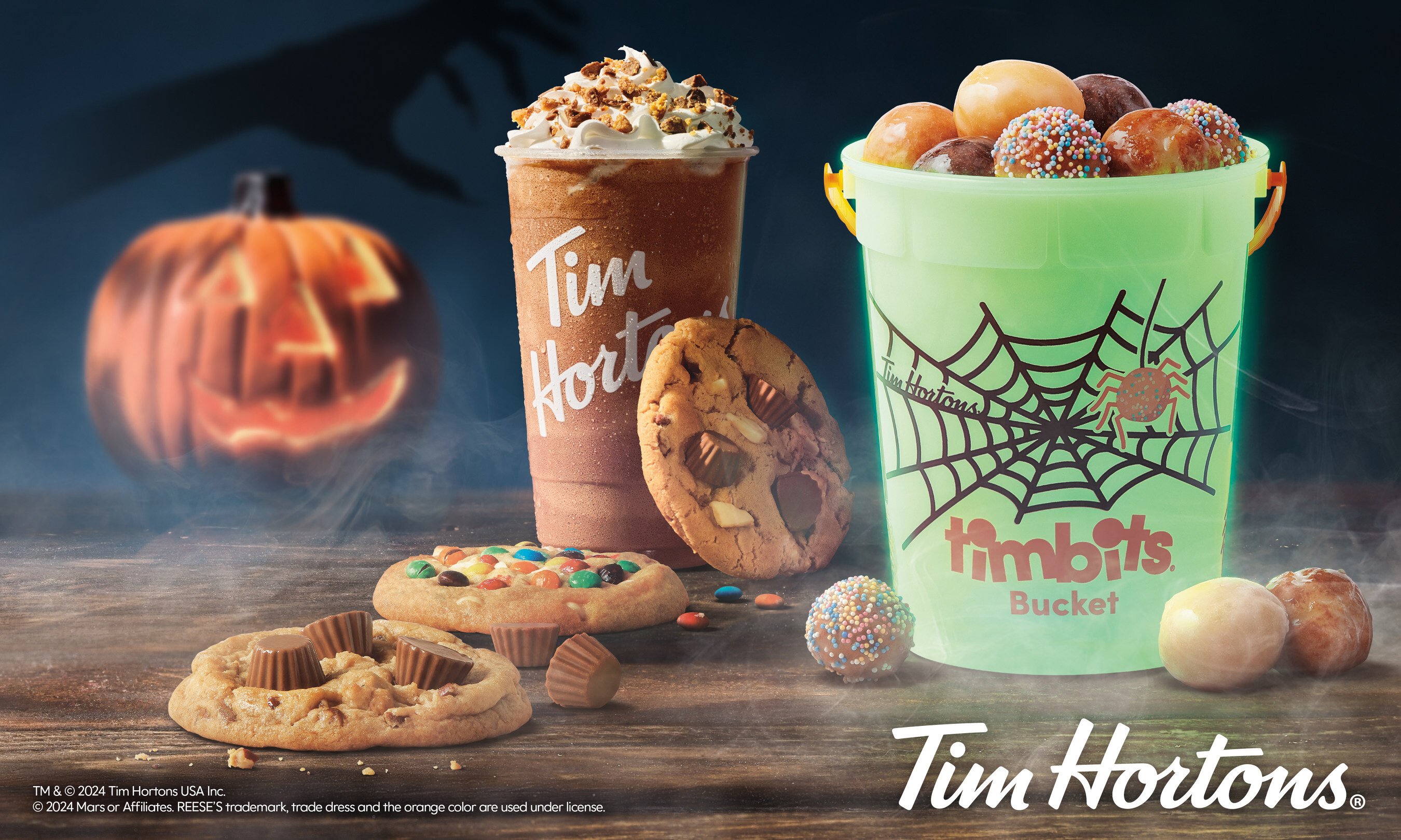 It's All Treats, No Tricks at Tim Hortons US this Halloween season - baked goods and beverages packed with Halloween favorites like REESE'S and M&M'S® as well as returning fan-favorite Timbits® Trick-or-Treat Buckets