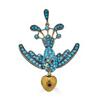 Victorian Era Turquoise and Garnet Bird Pendant. Image courtesy of KIL NYC