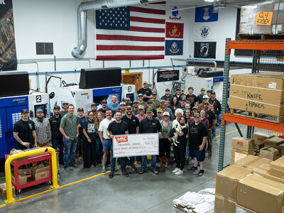 The Montana Knife Company team showcasing their donation of over $66,000 for the mikeroweWORKS Foundation.