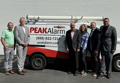 The Pye-Barker Fire & Safety and PEAK Alarm Company teams meet to celebrate and discuss the future working together to serve PEAK's local communities.