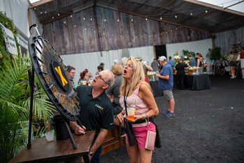 The Bourbon Wheel strikes the magical number one, offering a pour from a top shelf bourbon. Attendees at the Kentucky Bourbon Festival were invited to take a spin.