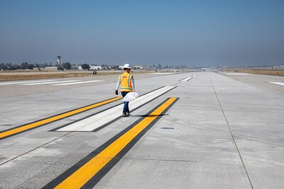 The $90 million project included the removal of old concrete and 80,000 square yards worth of repaving at the airport’s southernmost runway (8R-26L), along with the rehabilitation of adjacent taxiways, elimination of two adjacent taxiways, and construction of new Taxiway S8, the installation of LED lighting and other infrastructure improvements.