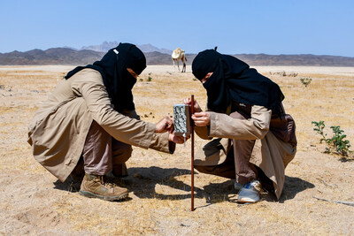 Rangers Suhaylah and Taghreed install a camera trap in Prince Mohammed bin Salman Royal Reserve