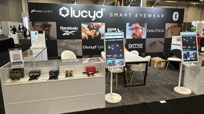 An image of Innovative Eyewear’s Lucyd activation at Vision Expo West, 
with two examples of the Lucyd Kiosk in the front. Courtesy of Innovative Eyewear, Inc.