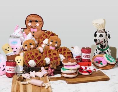 A new baking capsule collection features a plush toy set, pet/pet parent matching apron and hat, and oven mitt and toy sets. Food-and drink-themed toys make for festive hostess gifts.