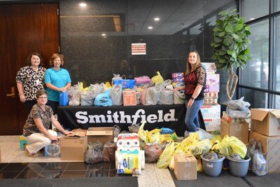 Smithfield Foods volunteers load nonperishable items and supplies to support neighbors impacted by Hurricane Helene.