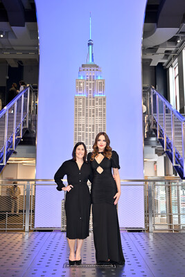 NEW YORK, NEW YORK - OCTOBER 04: (L-R) Smile Train CEO Susannah Schaefer and Elizabeth Gillies visit the Empire State Building in Honor of World Smile Day on October 04, 2024 in New York City. (Photo by Roy Rochlin/Getty Images for Empire State Realty Trust)