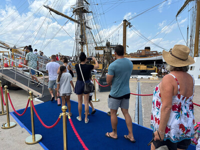 Visitors line up to board Amerigo Vespucci in Darwin