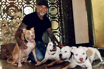 ASPCA ambassador Dave Bautista with his rescue dogs Ollie, Maggie, Penny and Talulah.