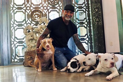 ASPCA ambassador Dave Bautista with his rescue dogs Ollie, Maggie, Penny and Talulah.