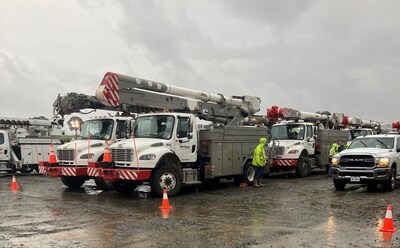 FirstEnergy crews preparing their vehicle at an electric utility staging site at Charlotte Motor Speedway following Hurricane Helene, Sept. 27, 2024.