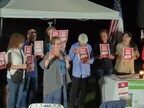 Everyone held posters representing the communities that lost neighbors that day