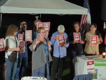 Everyone held posters representing the communities that lost neighbors that day