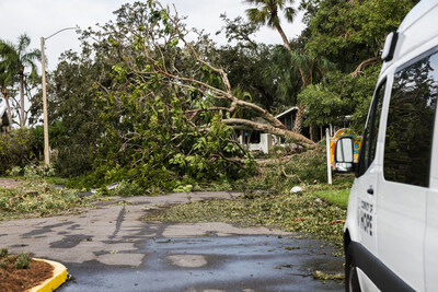 Trees block a road in a subdivision in the Sarasota, Florida area following Hurricane Milton.