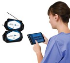 Nurse using Skytron Reveal on a tablet.