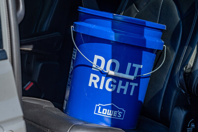 Each Lowe's disaster relief bucket is packed with sponges, goggles, moisture absorber, water, heavy-duty contractor trash bags, a flashlight and batteries.