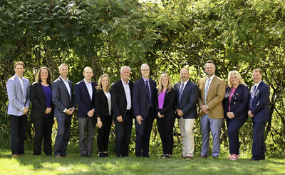 In the photo from left to right: Jack McNamara, Jennifer Beyl-Lee, Chad Broberg, Tom Selbo, Tammie Mark, Gary Tangwall, Todd Gillingham, Leah Brooks, Kurt Haugen, Bjorn Nesvold, Cathy Jenson, John Levi