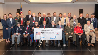 (Credit: Chip McCrea) Members of The Chosin Few, joined by Young Choi, President and CEO of StarKist Co., and the StarKist leadership team