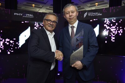 Rene Fasel, Founder of Phygital International (L) congratulates Yerbol Myrzabossynov, Minister of Tourism and Sports for the Republic of Kazakhstan