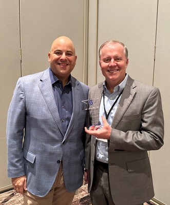 Jerry Valdez, executive director of Career Colleges and Schools of Texas (left) with Eddie Kreiner, Concorde Career College–San Antonio campus president at the awards ceremony.