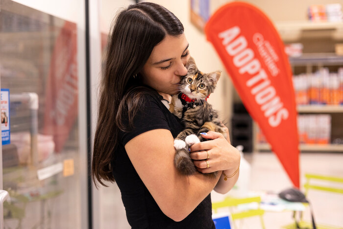 Nicole and her adopted kitten Rosie, the 400,000th pet adopted through PetSmart Charities of Canada. The charity invites potential adopters to visit a PetSmart store during National Adoption Week, October 21-27.  More than 100 local shelter and rescue partners will bring a host of adoptable pets into nearly every PetSmart store across Canada.