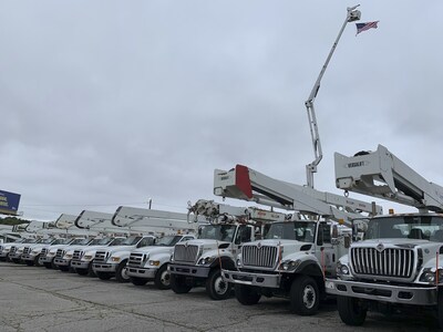 Versalift bucket trucks, donated for storm work, prior to shipment to Carolinas.