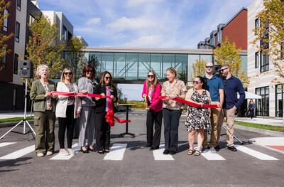 Melissa Kampersal, Executive Director, cuts the ribbon at The Baldwin's official grand opening. Pictured from left to right: Linda Carlton, Activities Director; Jennifer Oakman, Director of Facilities; Kathleen D'Amico, Director of Marketing; Danyelle Kavanagh, Health Services Administrator; Melissa Kampersal, Executive Director; Kim Patenaude, Director of Environmental Services & Transportation; Abbi Espinal, Director of Human Resources; Ryan DeCinto, Director of Accounting and Mike Cerasuolo, Culinary Director.