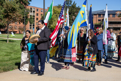 Healing ceremony parade of flags. Leading are drummer Lance Fisher and singer Giovanna Gross. Credit: Gallaudet University