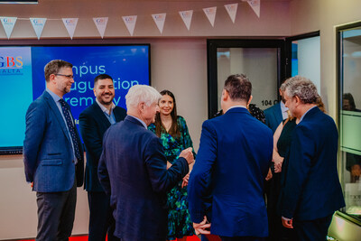 Members of the GEDU Group greet guests.