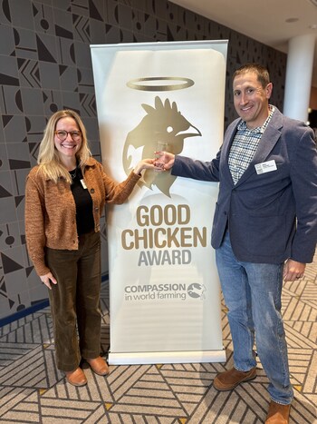 Julia Johnson the U.S. head of food business of Compassion in World Farming celebrates Mike Charles, founder and CEO of LaBelle Patrimoine for receiving the global 2024 Good Chicken Award.