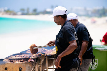 Working the grills at the Anguilla Culinary Experience Beach BBQ at the Anguilla Great House on Rendezvous Beach. Photo: Zuri Wilkes