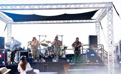 Mobility, the Air Force Band of the Golden West's rock ensemble, perform at Fleet Week in San Francisco.