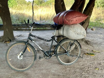 Buffalo Bicycle loaded with bags of Maize, ready to be transported to market