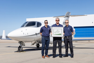 Honda Aircraft Company Flight Department personnel with NBAA accreditation certificate