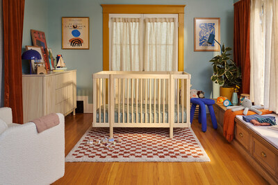 The Pogo 8-in-1 Crib and Pogo Tambour Dresser in Blonde.