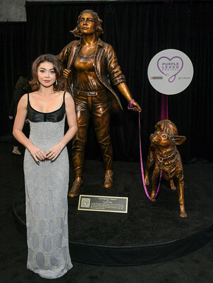 Sarah Hyland, recipient of the first-ever Variety Courage Award presented by Purina, takes in “Courageous Together” by Kristen Visbal, which was commissioned as part of the Purple Leash Project, an initiative led by Purina and the nonprofit RedRover, that aims to help more domestic violence shelters become pet friendly. The statue helped garner awareness for the cause at the Variety Power of Women Los Angeles event presented by Lifetime on October 24, 2024.