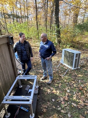 Kal Alwan of 1Click Heating & Cooling prepares for a heat pump installation. Photo credit: Vita Sgardello/EnviroCentre (CNW Group/1Click Heating and Cooling Inc.)