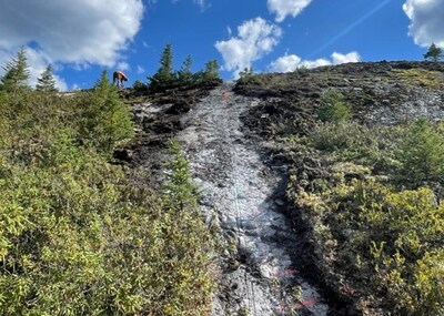 Figure 15: Saw-cut channel ready for sample layout marking at the CV5 Spodumene Pegmatite. (CNW Group/Patriot Battery Metals Inc.)