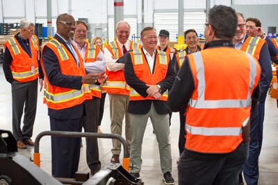 Assistant Secretary of State for Diplomatic Security Gentry Smith (left) and GM Defense President Steve duMont (center) tour the GM Defense Manufacturing and Customer Innovation Center Monday, October 28, 2024 in Concord, North Carolina. (Photo by Steve Fecht for GM Defense)