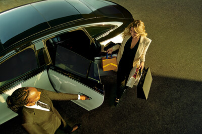 Blacklane chauffeur opens door to a guest in Dubai