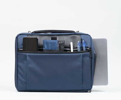 Tech Folio size Medium -- with front pocket contents and MacBook slid out of interior padded compartment
