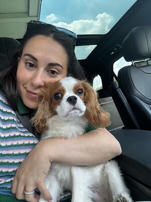 Claudia Oshry and her Cavalier King Charles Spaniel, Romeo.