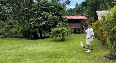 Launching the quadcopter drone with the Geoshark magnetometer. (CNW Group/Adyton Resources Corporation)