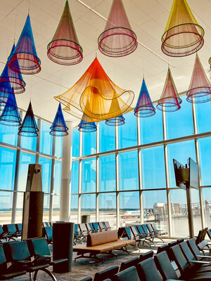 Departures level looking northeast toward runway. Featuring art installation.