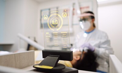 A PDS Health dental hygienist performs a bacterial decontamination procedure on a patient using advanced laser technology. This procedure has been shown to reduce the bacterial load found within the gum tissue.